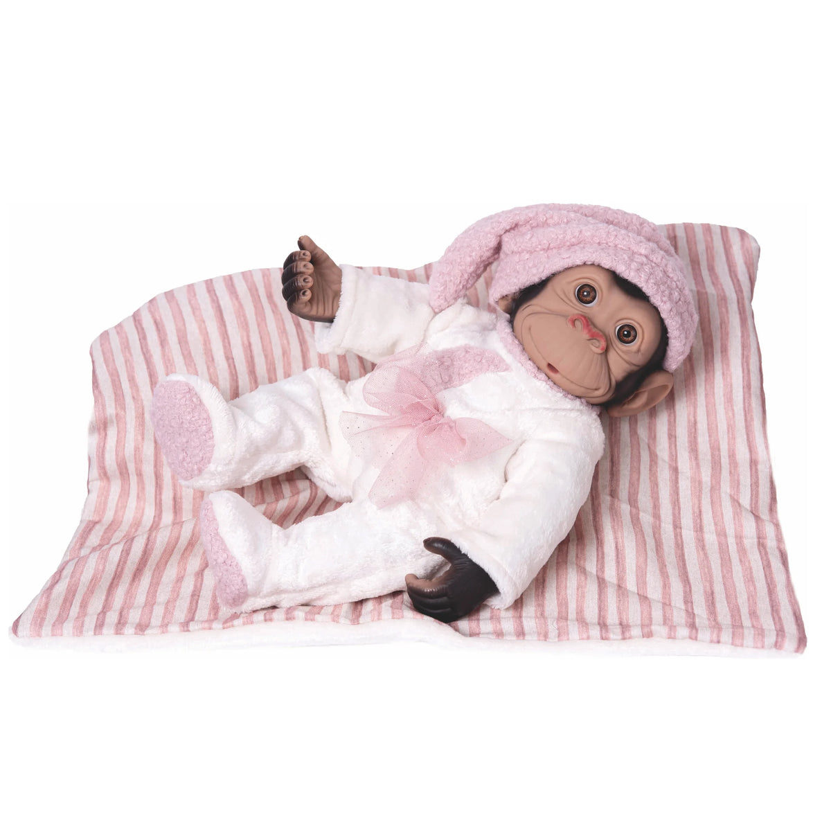 Mono reborn de Rosatoys 3351 de 35 cm tumbado con pijama blanco de peluche, gorro de dormir rosa y manta a rayas