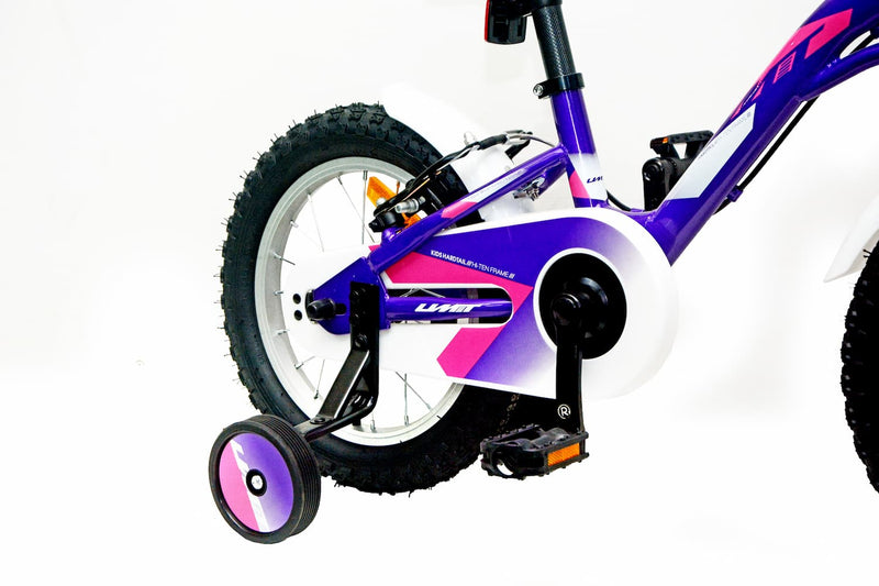 Bicicleta UMIT Alice 14" violeta con plato de seguridad cerrado, frenos V-Brake adaptados a niñas, cesta frontal decorativa y estructura de acero resistente para máxima durabilidad
