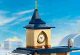 Detalle de los dos andenes con panel de horarios y máquina de billetes del LEGO 60469