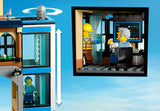 Cafetería bajo cubierta transparente con la minifigura de barista de la estación LEGO City