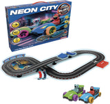 Caja del circuito de slot Velokú Racers Neon City de Ninco (91021) con la pista en ocho, los dos mandos y los karts de Turbo y Felina