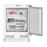 Congelador vertical integrable Beko BU1204N con la puerta abierta y sus 3 cajones