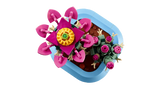 Cactus LEGO vista superior con flor rosa grande, espinas beige y maceta azul