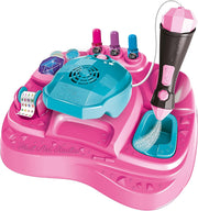 Caja del kit de manicura Diseña tus Uñas de Luxe mostrando los esmaltes, accesorios brillantes y decoraciones incluidas para diseñar uñas glamurosas de Clementoni
