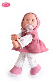 Capota, vestido y chupete con cinta en tonos delicados
