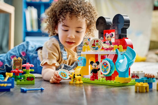 Casa Mickey Mouse DUPLO con tobogán y huerto juguete
