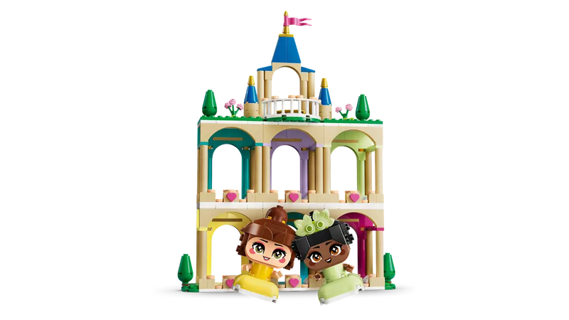 Castillo LEGO 3 niveles beige con arcos colores y torre azul bandera rosa
