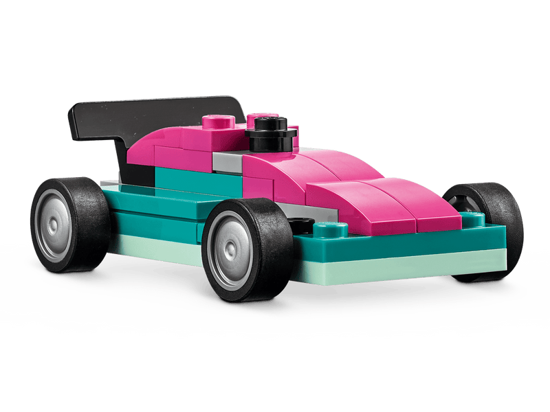 Coche de carreras LEGO rosa y turquesa del set Vehículos Creativos 11036 con ruedas negras
