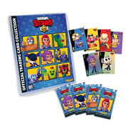 Colección completa Panini Brawl Stars mostrando álbum de cromos, sobres de cartas y cartas coleccionables desplegadas con los luchadores más icónicos del juego en cartas base y especiales
