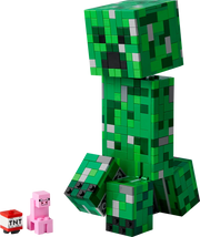 Detalle del Creeper™ LEGO® con cabeza desmontable revelando un Creeper clásico y TNT.