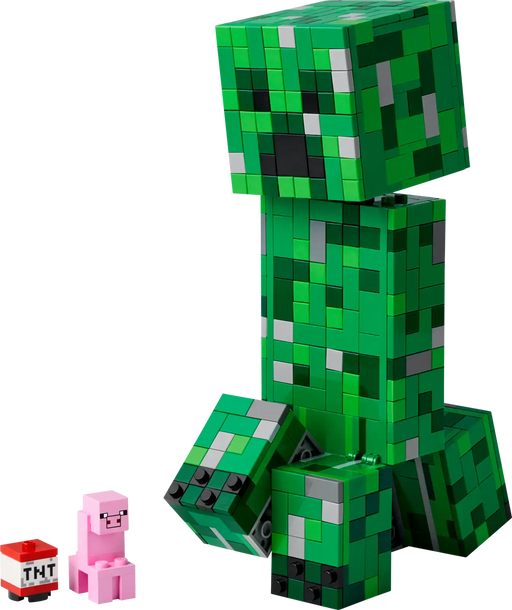 Detalle del Creeper™ LEGO® con cabeza desmontable revelando un Creeper clásico y TNT.