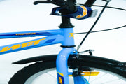 Detalle del sistema de frenos V-Brake de la bicicleta UMIT Casper 16" azul, mostrando la calidad de los componentes y el manillar ergonómico ajustable para mayor seguridad infantil
