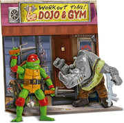 Figuras de acción Tortugas Ninja Movie Face Off mostrando a Raphael y Rocksteady con detalles auténticos de batalla, equipamiento completo y poses dinámicas listas para el combate
