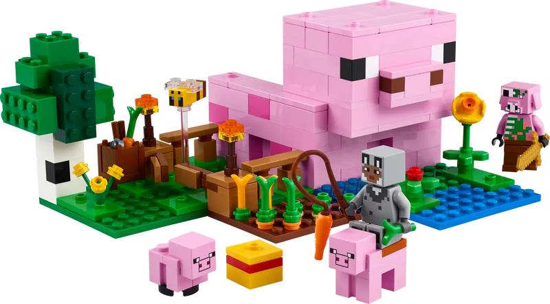LEGO Minecraft 21268 Casa-Cerdo Bebé construida mostrando la casa con forma de cerdo con interior equipado (mesa de trabajo, cama, librería), campo con entrada para el cerdo bebé, huerto de verduras y personajes incluidos. Set de construcción de 238 piezas de 8x19x16 cm basado en el videojuego Minecraft.

