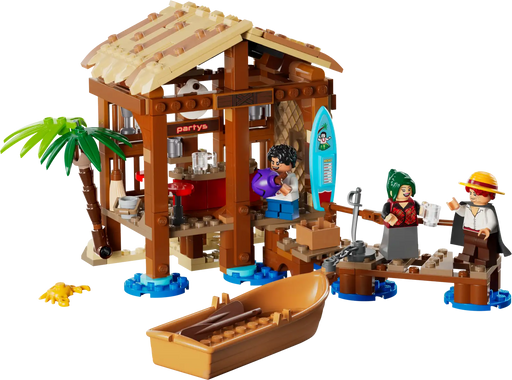 LEGO ONE PIECE set 75636 con caja del producto y cabaña construida mostrando Luffy, Shanks, Makino en escena de playa con bote pirata y embarcadero detallado
