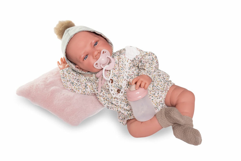 Muñeca 33001 Lúa con gorro de pompón y pelele floral
