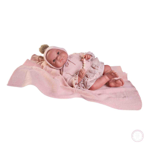 Muñeca Nica con vestido rosa y certificado
