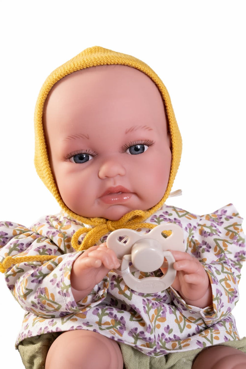 Muñeca recién nacida posturas realistas y chupete