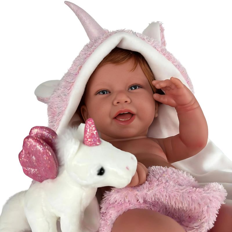 Muñecas Antonio Juan Recien Nacida Nica Pelirroja capa y peluche de unicornio (5000)