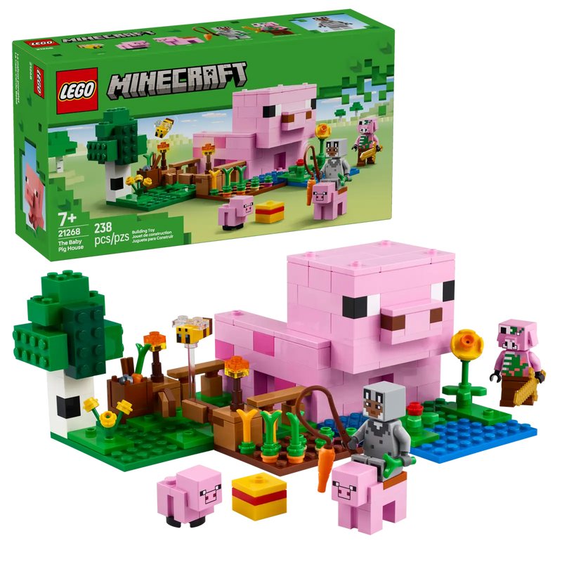 Packaging completo del LEGO Minecraft 21268 La Casa-Cerdo Bebé mostrando la caja y el modelo construido de 19 cm con casa en forma de cerdo, huerto con cultivos de patatas y remolachas, 5 figuras (héroe lobo, cerdo bebé, cerdo adulto, abeja, Piglin Zombi). Set de 238 piezas del bioma Bosque para niños a partir de 7 años con garantía de 3 años.
