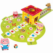 Piezas de madera del juego: cerditos, casas y lobo.
