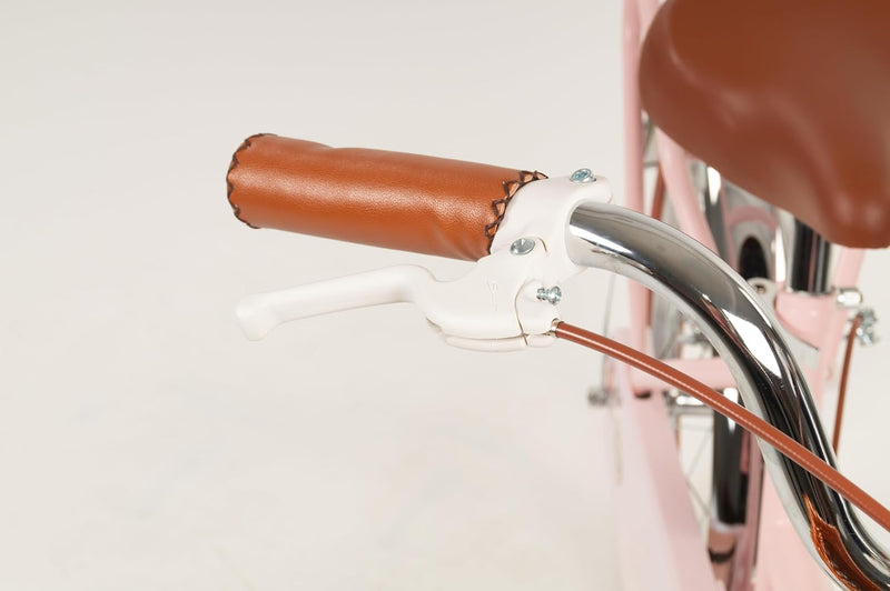 Primer plano del manillar con empuñadura marrón y freno blanco de la bici Toimsa 20"
