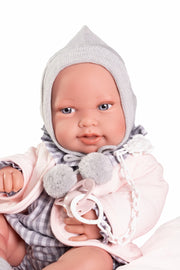 Recién Nacida de vinilo con cama acolchada
