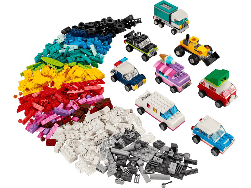 Set completo LEGO Classic 11036 con 900 piezas clasificadas por colores y vehículos construidos
