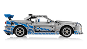 Vista lateral LEGO Nissan Skyline 42210 mostrando suspensión funcional y puertas abiertas
