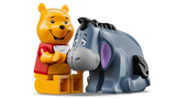 Winnie the Pooh LEGO 43300 sentado con tarro HUNNY y minifiguras Pooh e Ígor
