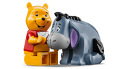 Winnie the Pooh LEGO 43300 sentado con tarro HUNNY y minifiguras Pooh e Ígor
