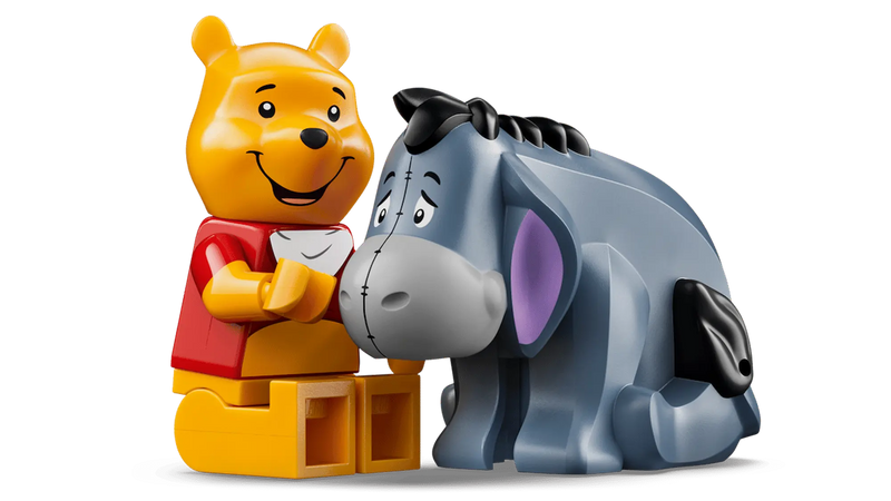 Winnie the Pooh LEGO 43300 sentado con tarro HUNNY y minifiguras Pooh e Ígor

