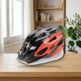 Biocycle Casco Rocket T-L Naranja Negro (BIOCYCLE-H-406Q18) sobre una mesa de madera