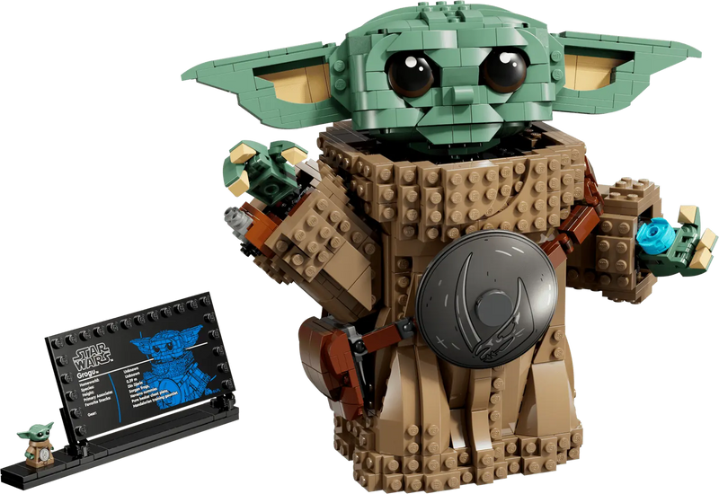 Figura LEGO Grogu 75446 construida: armadura Beskar con escudo Mudhorn, bolsa con galleta azul, placa informativa Star Wars y minifigura estándar