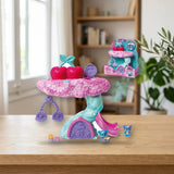 Cherry Pets Confetti Tree — Casa Árbol Koala Twins sobre una mesa de madera