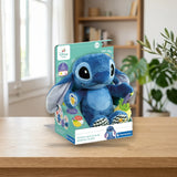 Stitch Calm & Play CLEMENTONI - Peluche Musical Sensorial para Bebés desde 0 Meses sobre una mesa de madera