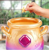 Magic Mixies peluche rosa de Famosa con su caldero y varita mágica