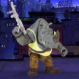 Figura articulada de Rocksteady de las Tortugas Ninja de Famosa con su blaster