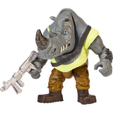 Figura articulada de Rocksteady de las Tortugas Ninja de Famosa con su blaster