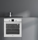Horno de gas Vitrokitchen HG602 blanco encastrado en un mueble de cocina