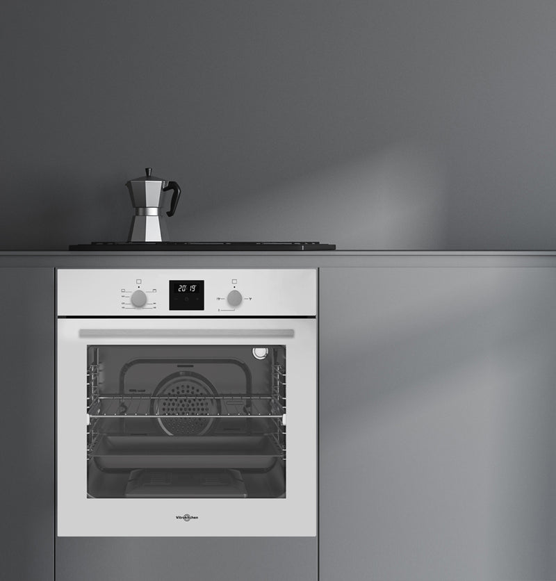 Horno de gas Vitrokitchen HG602 blanco encastrado en un mueble de cocina