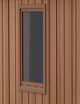 Ventana fija de la caseta Keter Darwin sobre paneles efecto madera