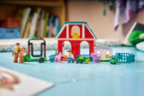 Niños jugando con el rancho ecuestre LEGO de Toy Story 5