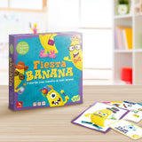 Caja de Fiesta Banana Lúdilo con las cartas sobre la mesa