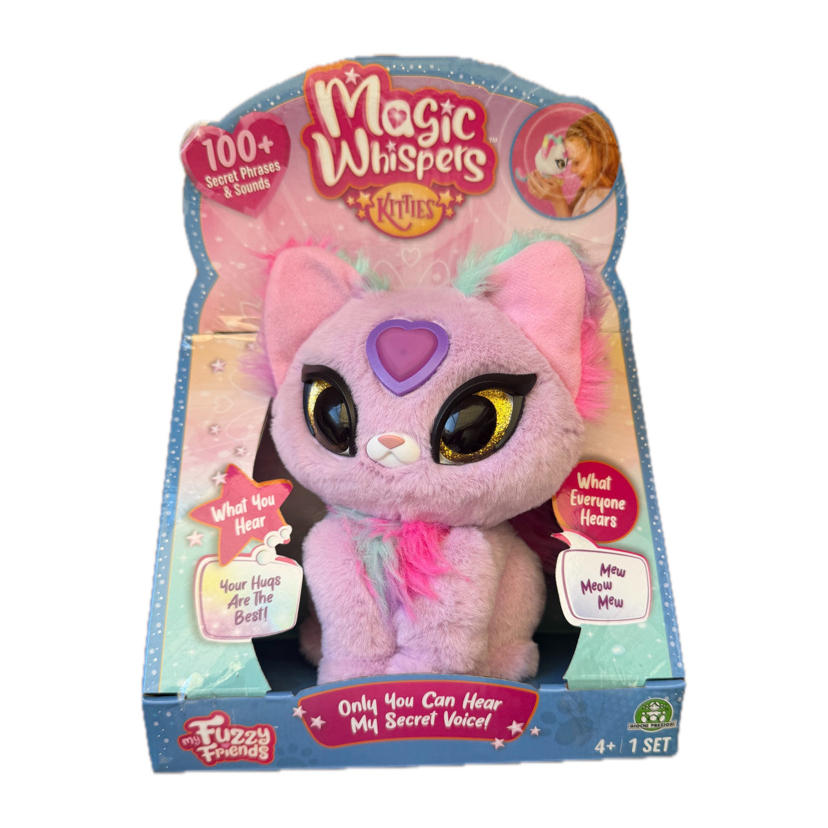 Magic Whispers Zoey en su caja actual Magic Whispers Kitties, gatito rosa con corazón morado