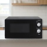 Microondas Infiniton MW-B2210 20L Negro en la encimera de la cocina