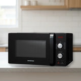 Microondas Infiniton MW-F102 20L Negro en la encimera de la cocina