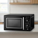 Microondas Infiniton MW-RT20B 20L Negro en la encimera de la cocina