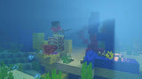 Minecraft en Nintendo Switch 2: jugador nadando entre corales en el fondo del mar