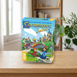 Caja de Carcassonne Junior de Devir sobre una mesa de madera en un salón